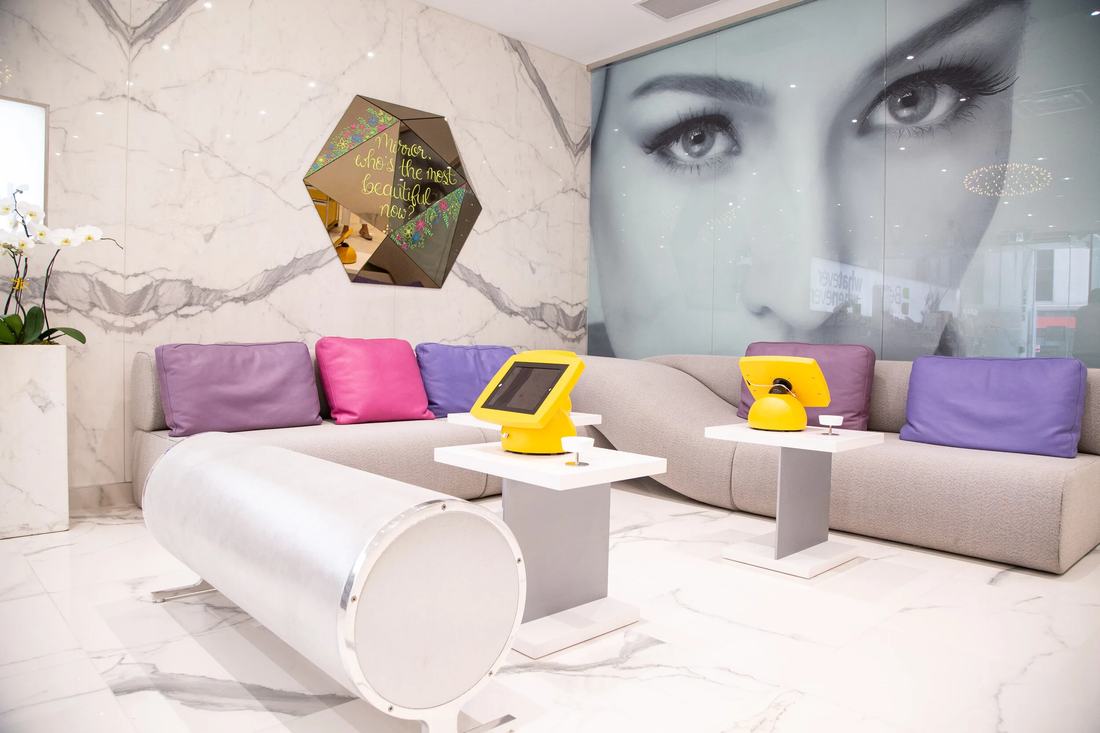 Seating and wall art in the Midtown lobby
