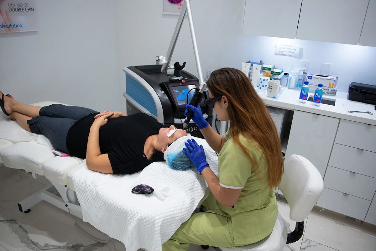 A Bellair nurse performing a skin treatment